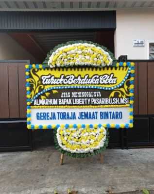 Papan Bunga Duka di Gandrung
